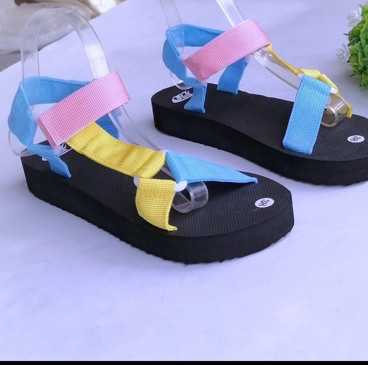 trekkers with yellow/blue/pink straps