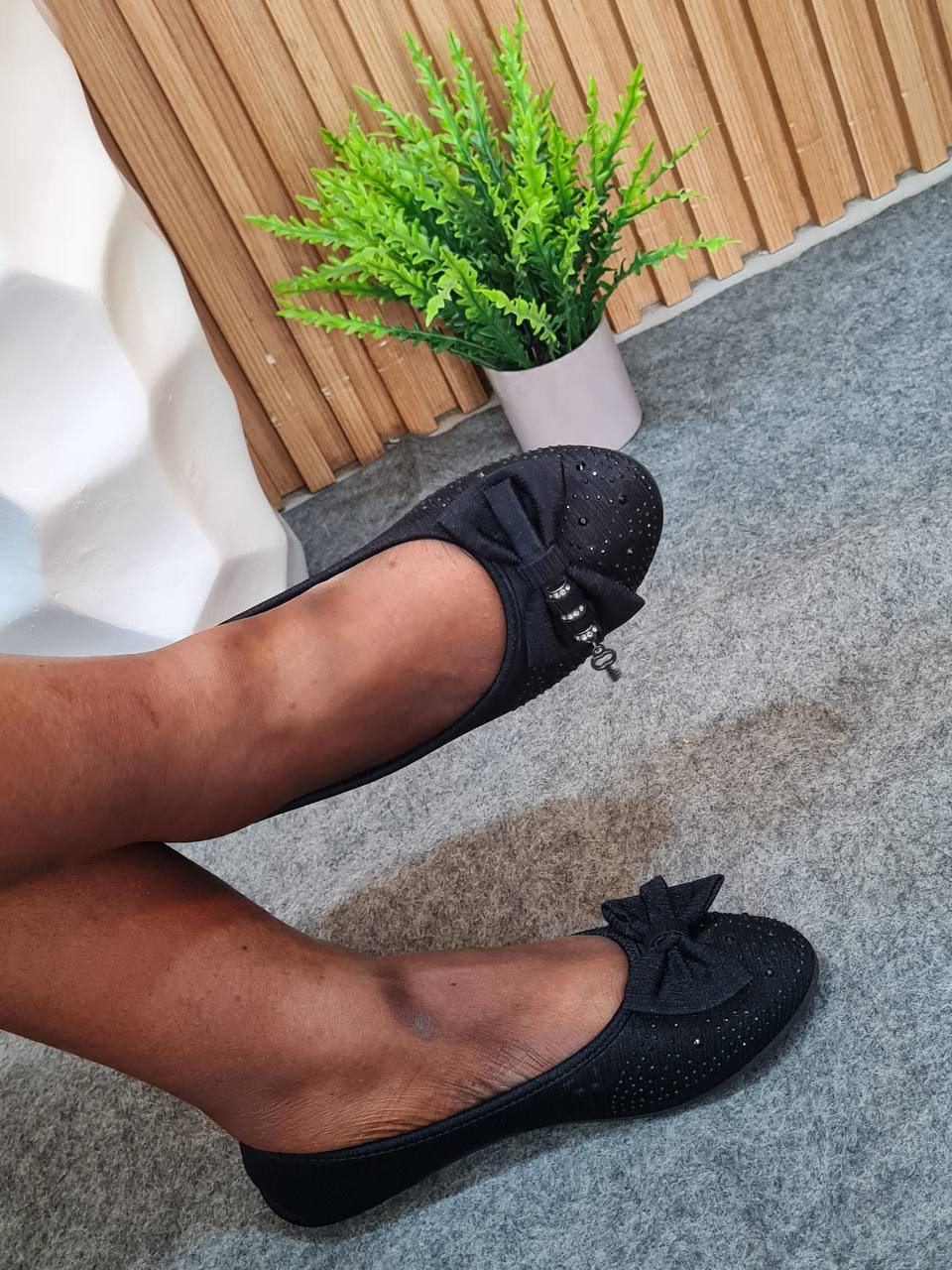 looking smart with black and bow with a small key at the edge - black