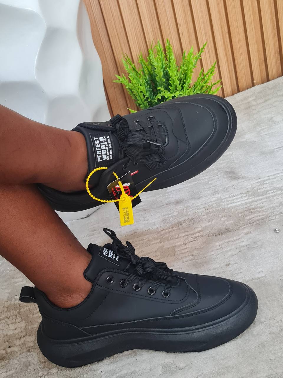 plain black sneakers