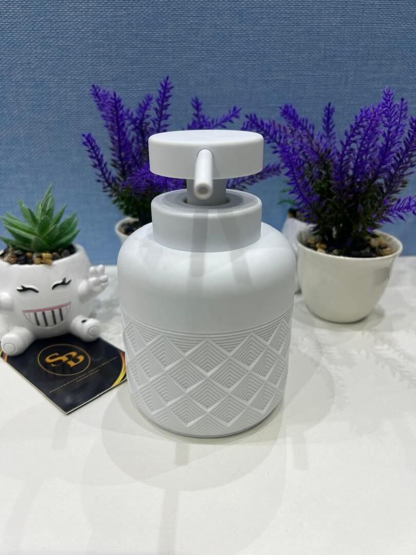 half kite and plain patterned home and fun soap dispenser